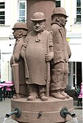 "Krons Ton" on Heuschreckbrunnen in Trier, Germany.