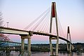 Mark I train crossing the SkyBridge at sunset