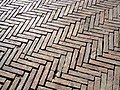 Herringbone bond pavement