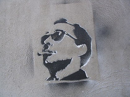 Stencil graffiti of Jean-Luc Godard in Rue Villeneuve, Montreal, Canada, photo: James Stencilowsky