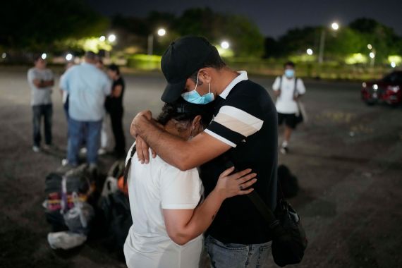 Migrants embraced upon arriving in Panama City.