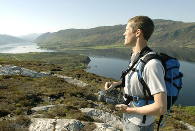 Geologist using field tablet