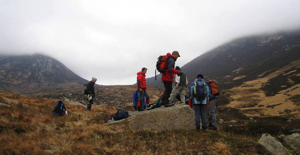 View up Glen Rosa towards Cir Mhor, Arran. Andrew Finlayson and Martin Gillespie in foreground.