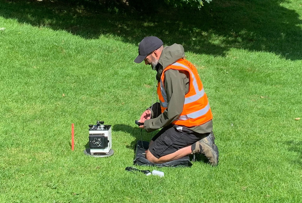 Gravity measurements being made over the buried sinkhole. BGS © UKRI.