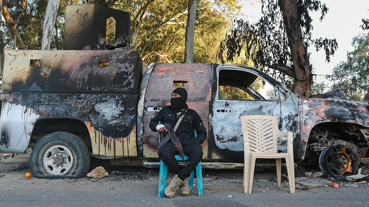 A member of the security forces loyal to the interim Syrian government guards a checkpoint