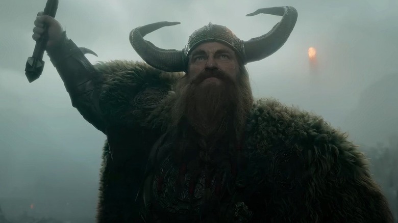 Stoick the Vast raises his axe in battle in How to Train Your Dragon