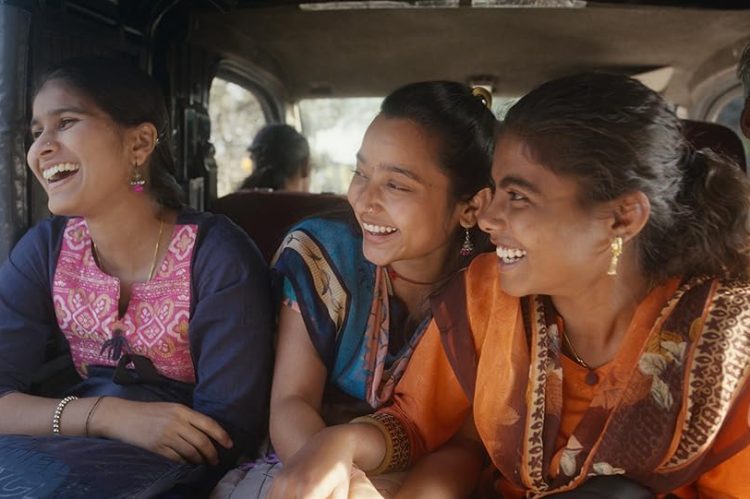 Stills from the film *A Match* showing three women laughing in the back of a vehicle.