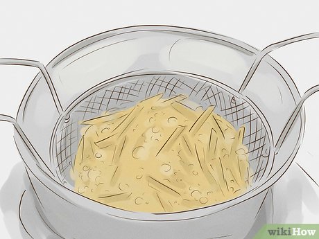 Step 7 Deep-fry foods in oil to make them crispy on the outside.