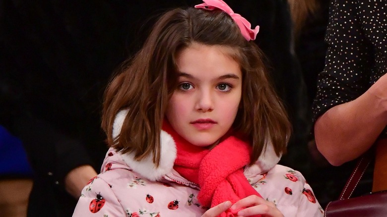 Suri Cruise posing